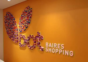 a wall mounted sign that says babies shop. CorpoRASTI Regalos empresarios