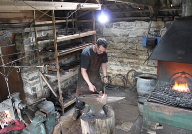 Paul working on a piece of metal