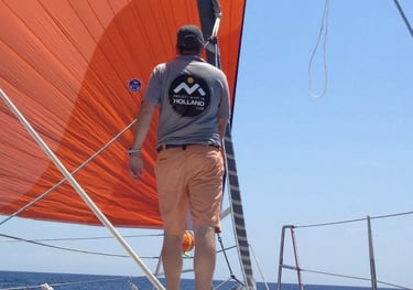 sailplan specailist checking the sails on a yacht