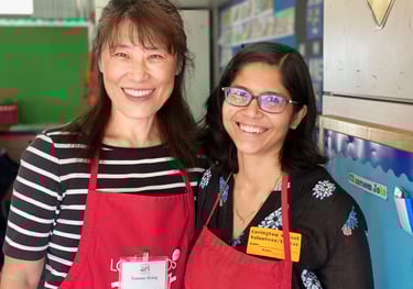two docents standing together