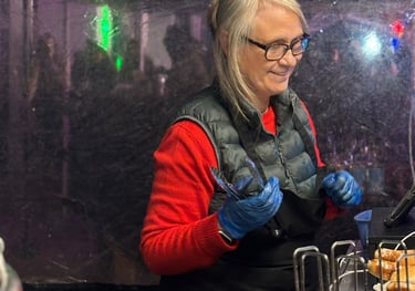Friendly staff serving food at wedding
