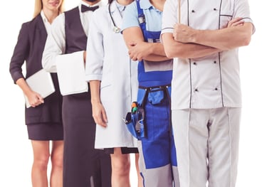 a group of people standing in front of a white background