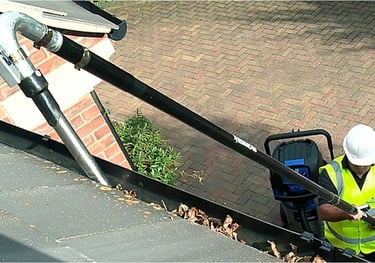 Gutter Vacuum in use by operator at C Thru Window Cleaners, Exeter.