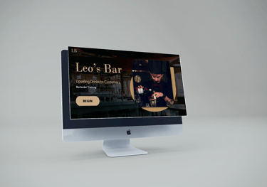 a computer monitor screen displaying a picture of a man pouring a drink