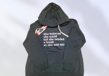 a black hoodie with a funny quote.