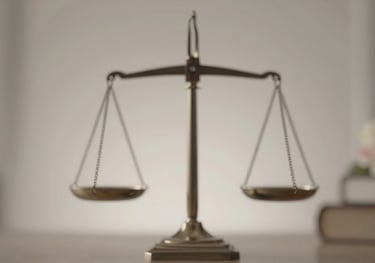 An abstract, sophisticated image of scales of justice softened by floral elements. Professional and empathetic. Palette: #3E3C3B, #F6F4F0.