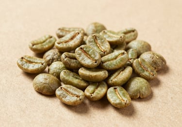 Elegant studio shot of dry green coffee beans on a kraft paper surface, minimalist composition, soft side lighting highlighting textures.