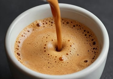 Close-up of a perfectly poured espresso with rich golden crema in a minimalist ceramic cup, dark charcoal background, luxury feel.