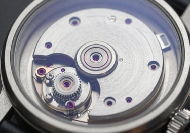 A close-up of a mechanical watch movement through a glass case, showcasing precision and the sophisticated discipline of high performance.