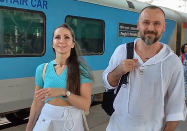 A couple in front of High Speed train Gatiman express at Agra cantt railway station.