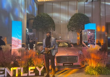 Luxury corporate event with professional saxophonist performing for glamorous London gathering