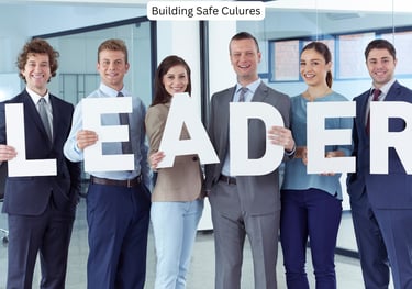 Leaders holding letters each letter spelling LEADER after workshop