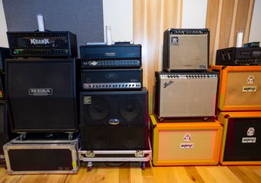 Guitar amps and cabinets at the recording studio.