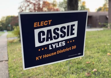a sign that says, elect Cassie Lyles