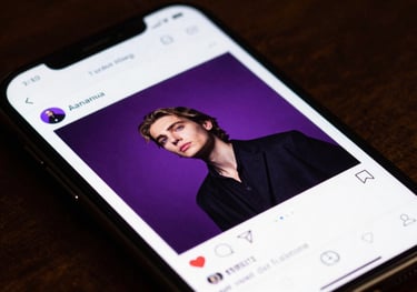 A close-up shot of a smartphone displaying a social media feed with vibrant, high-quality content and rich amethyst purple accents.