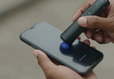 A detailed shot of a person using a biometric fingerprint scanner on a sleek mobile device, South American setting.