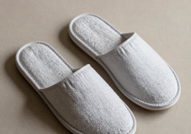 a man riding a skateboard down a street next to tall buildings