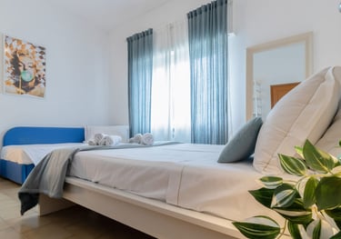Casa Rava Sul Parco Camera da letto