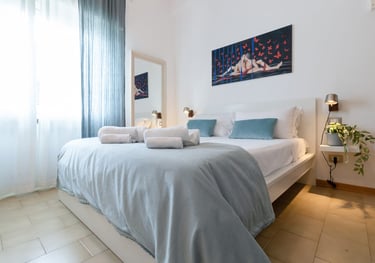 Casa Rava Sul Parco Camera da letto