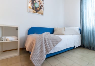 Casa Rava Sul Parco Camera da letto