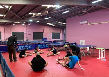 Members stretching before practise
