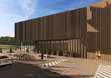 Modern architecture of Lentvario baseinas swimming pool featuring a vertical wood slat facade and pedestrian plaza.