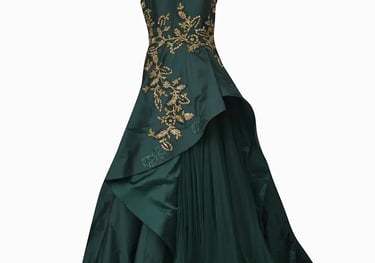 a green dress with a gold and black dress