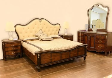 a bedroom with a bed and a mirror