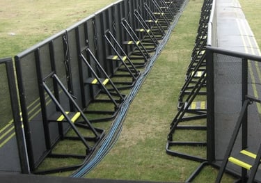 Mojo style crowd barricade setup at a concert.