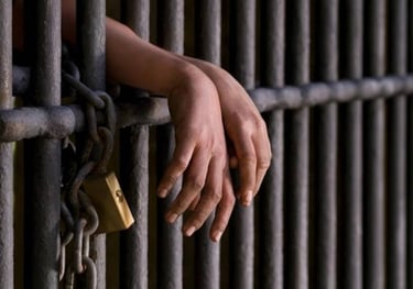 a person's hand holding a padlocked padlocked padlocked