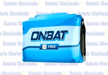 Bateria Onbat azul, com o selo 'FREE' escrito, sobre fundo com o texto "Bateria Uberlândia".