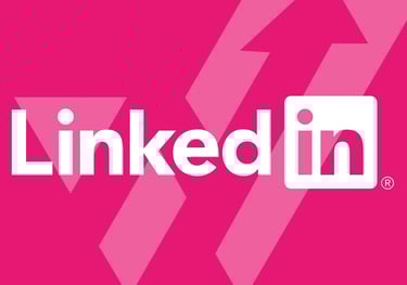 LinkedIn logo in white on a bright pink background with abstract arrow shapes