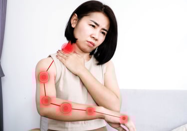 Woman with a line from neck down her arm with red hot spots indicating a pinched nerve.