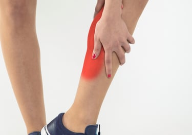A red hotspot on the back and inside calf muscle showing pain such as from shin splints.