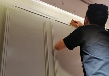 a man is wrapping a wall with a wrap job