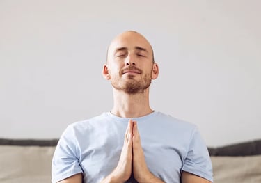 man with hands together, finding inner peace and starting to heal his mind