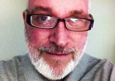 Portrait of Mark T Gillan