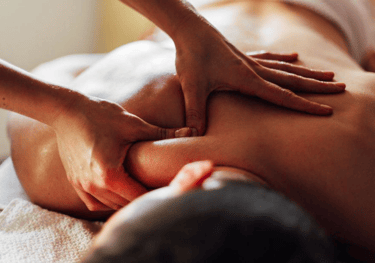 Man getting a deep tissue shoulder massage.
