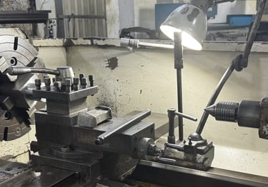 a machine shop with a machine that is working on a machine