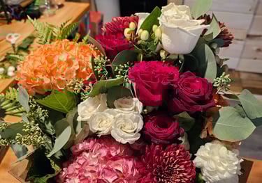 a bouquet of flowers in a box