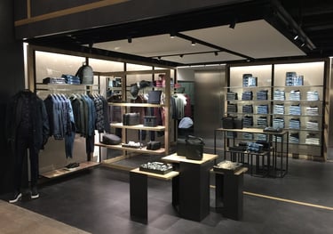 Interiors of Giorgio Armani outlet stores, a retail project carried out by BRB Engineering srl