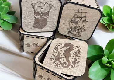 a group of four wooden boxes with a pirate ship on it