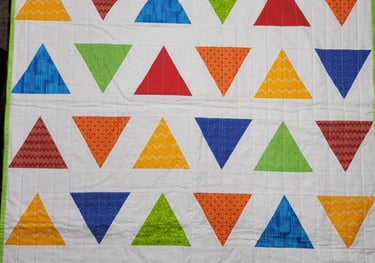 Triangle Pop Quilt Pattern by Emily of Quilty Love