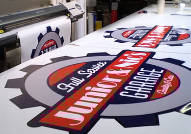 Printed signage and branded apparel by All Pro Signs