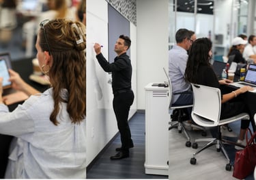 A man writing on a white board, demonstrating AI workflows
