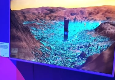 a television screen showing a digital art motion design by artist