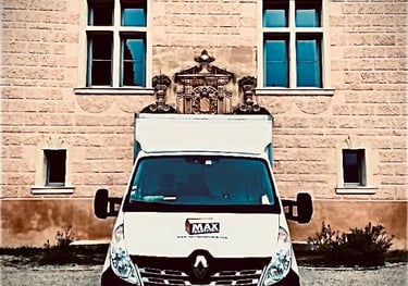 a van parked in front of a building