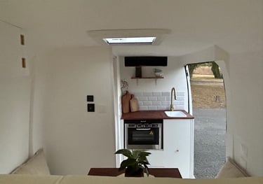 a kitchen with a small kitchenette and a small kitchen