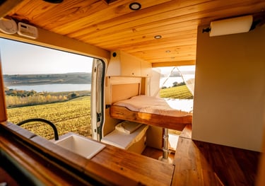 a bedroom with a bed and a sink