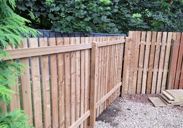 fenced in area with gravel